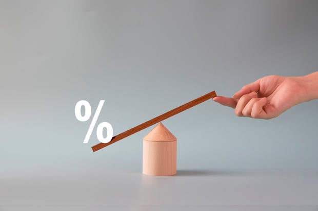 Conceptual finance or business growth trend still life with balance scale. Stock photo.