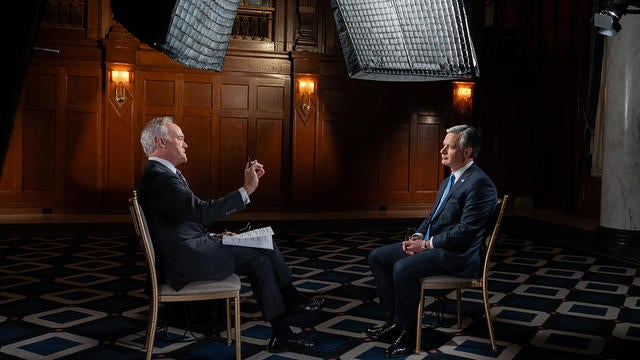 Scott Pelley and Christopher Wray 