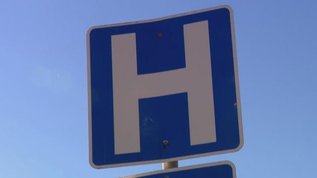blue hospital street sign 