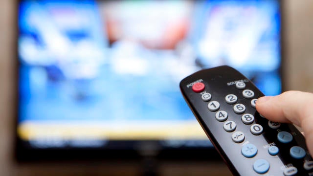 TV television remote pointing to screen 